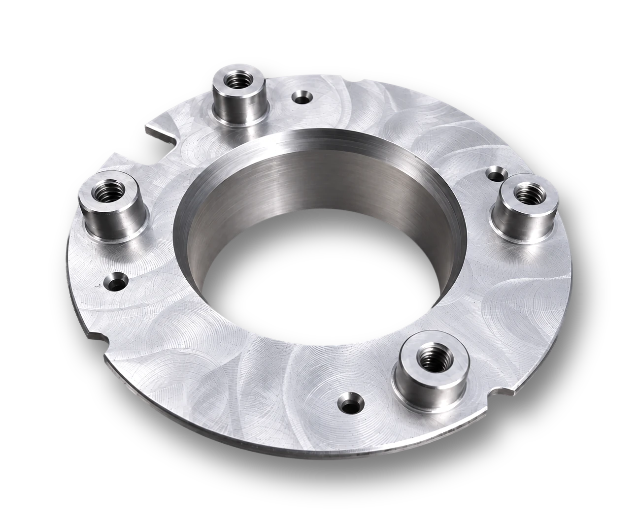 Circular flange with visible face milling marks, threaded bosses and perimeter notches